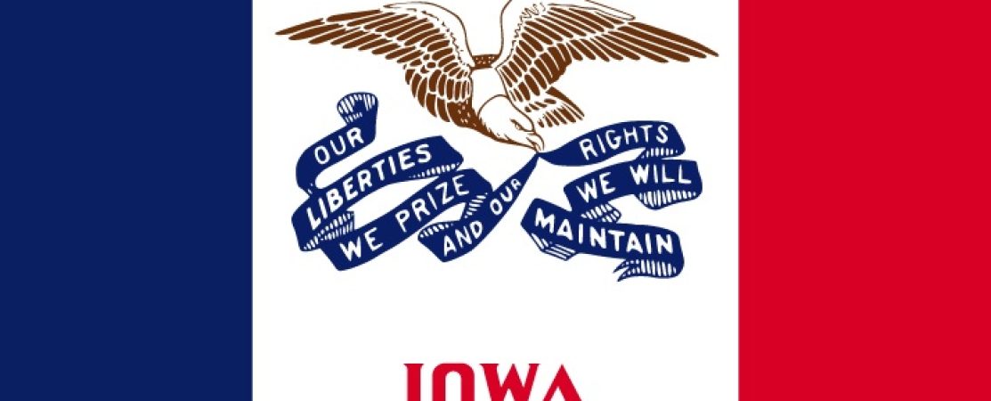This is the flag of Iowa, depicting an eagle holding a banner that reads, "Our liberties we prize and our rights we will maintain."